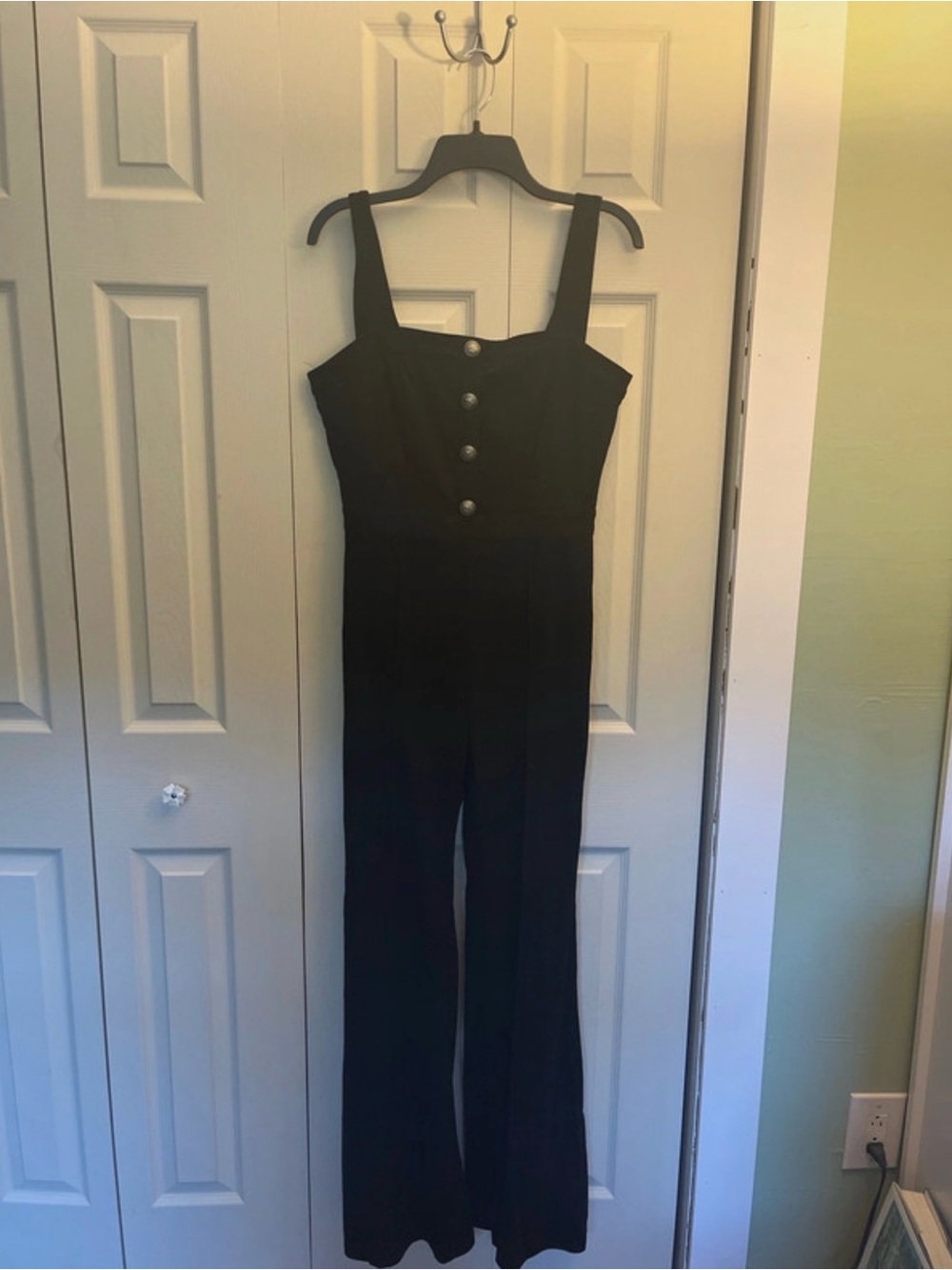 Unique Vintage Black Flared-Leg Jumpsuit with Button Front Detail